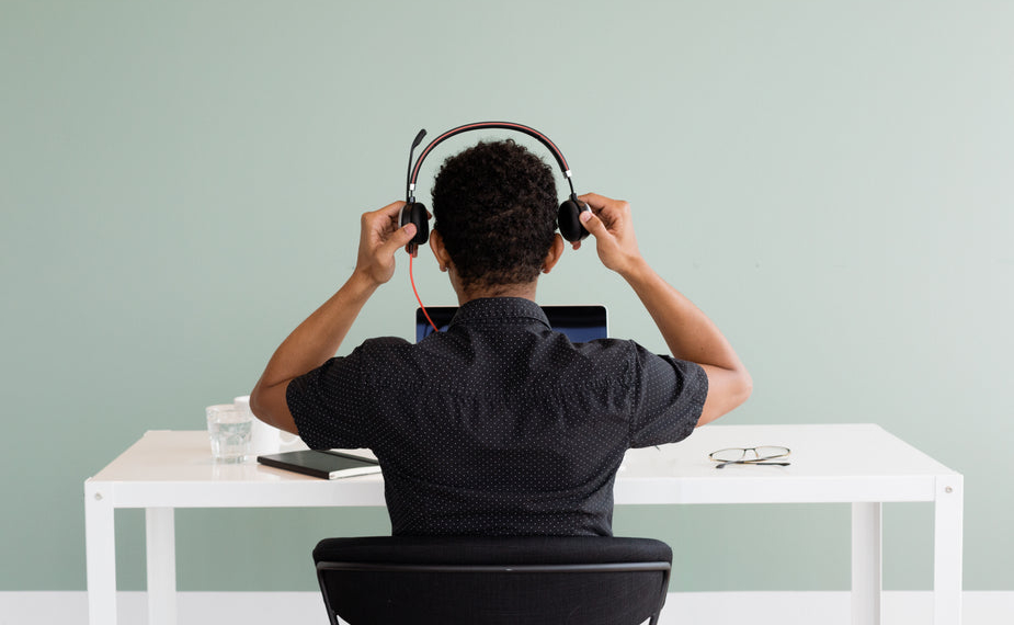 A person on work with headphones